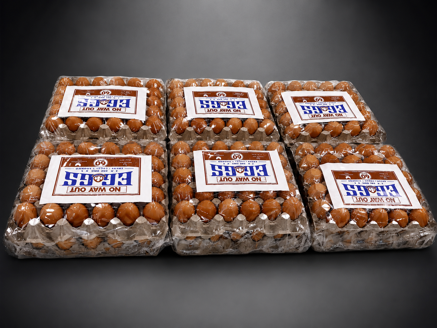 Two trays of brown eggs stacked on dark wooden surface, dramatic warm side lighting, rich earthy atmosphere